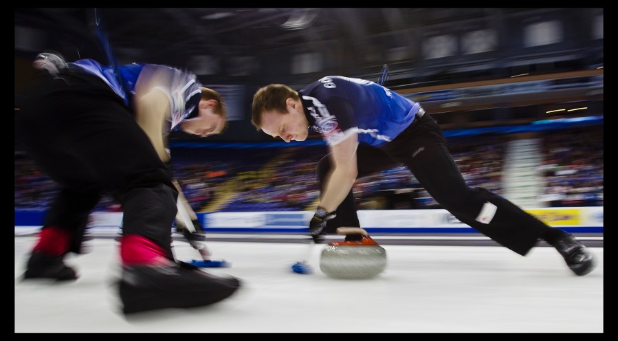 Scotland Third Thomas Brewster and Second Scott Andrews curling