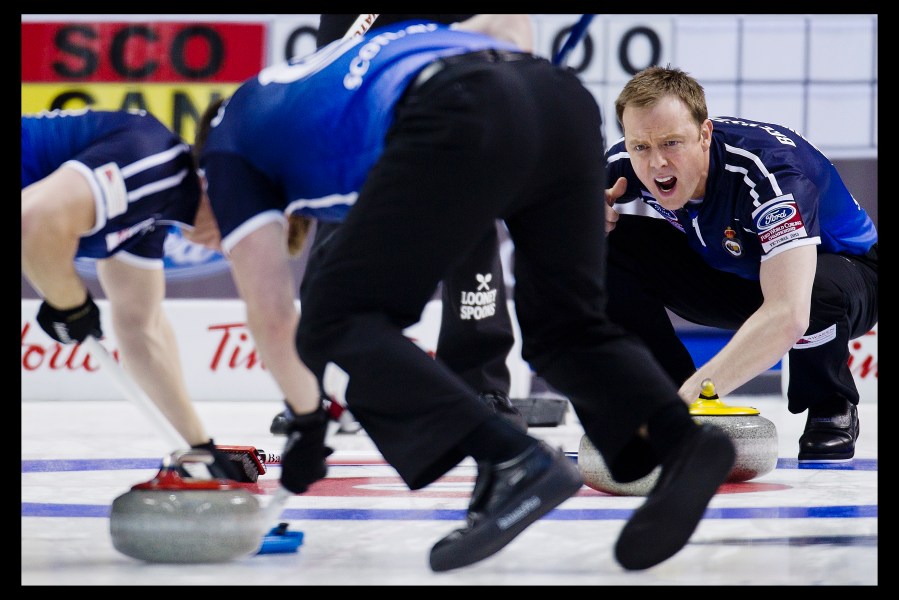 Scotland Third Thomas Brewster and Second Scott Andrews curling