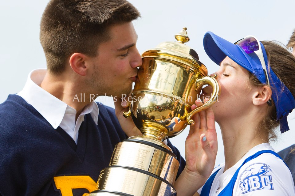The University of British Columbia UBC Thunderbirds varsity Mens and Women's rowing crews celebrate their victory over the University of Victoria Uvic Vikes rowing crews at the 2014 Brown Cup challenge race held on the Gorge Waterway in Victoria British Columbia Canada. The Uvic women and UBC men took the reserve races. All Rights Reserved Kevin Light 