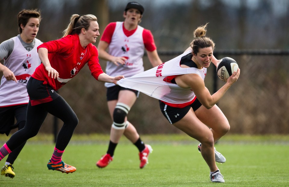 Julia Greenshields grabs the jersey of Kelly Russell during a team practice at the Pacific Institute for Sports Excellence in Victoria, British Columbia Canada on January 25, 2016. (Kevin Light/CBCSports)