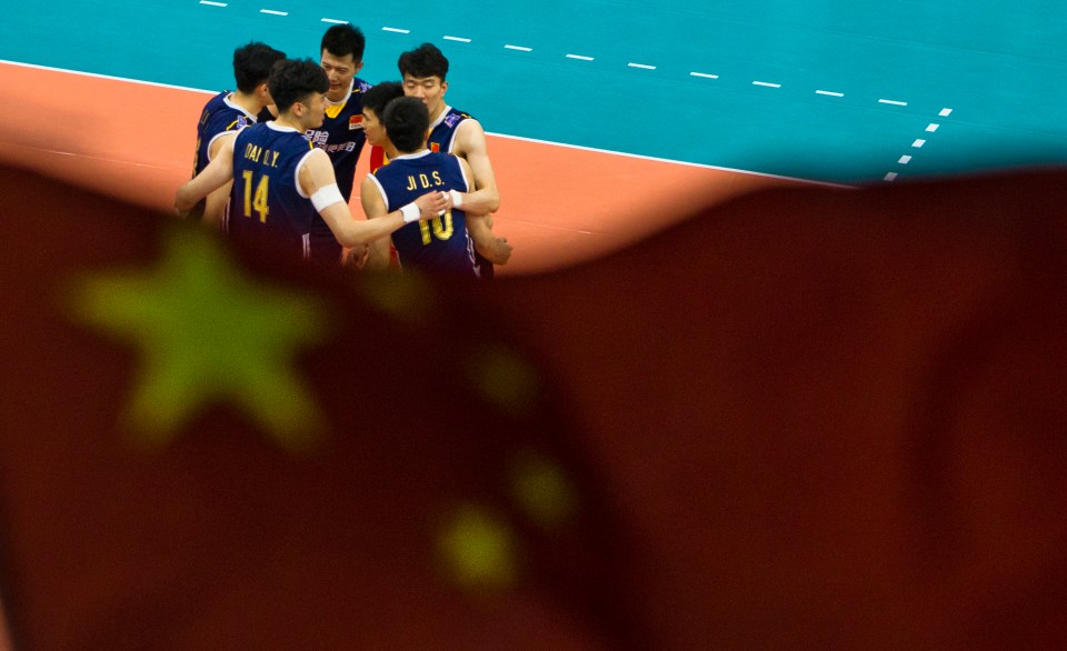 Qingyao Dai (14) and Daoshuai Ji (10) of China Volleyball Kevin LIght Photo