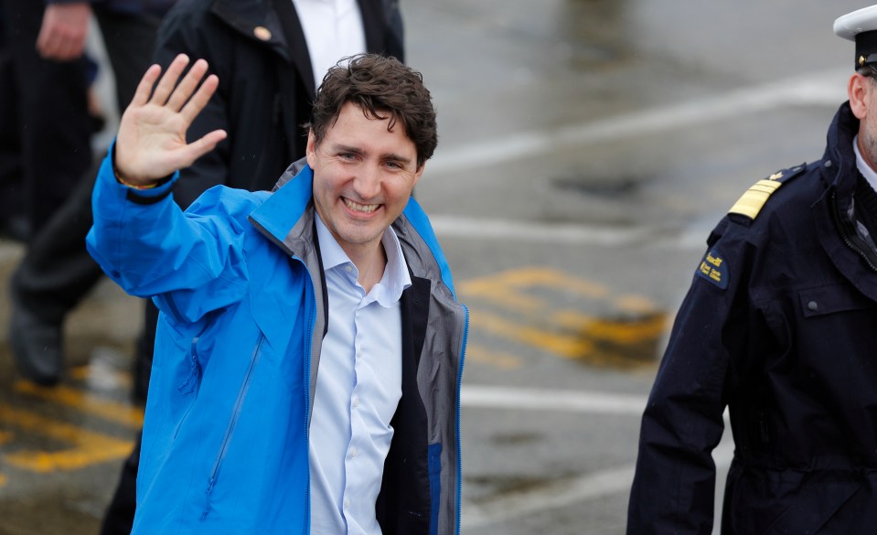 Canada's Prime Minister Justin Trudeau, waves prior to meeting with Canadian coast guard workers in Victoria